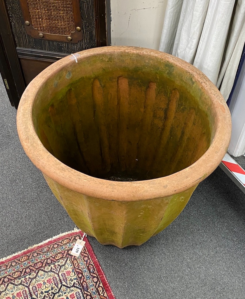 A large terracotta garden pot, diameter 66cm height 63cm